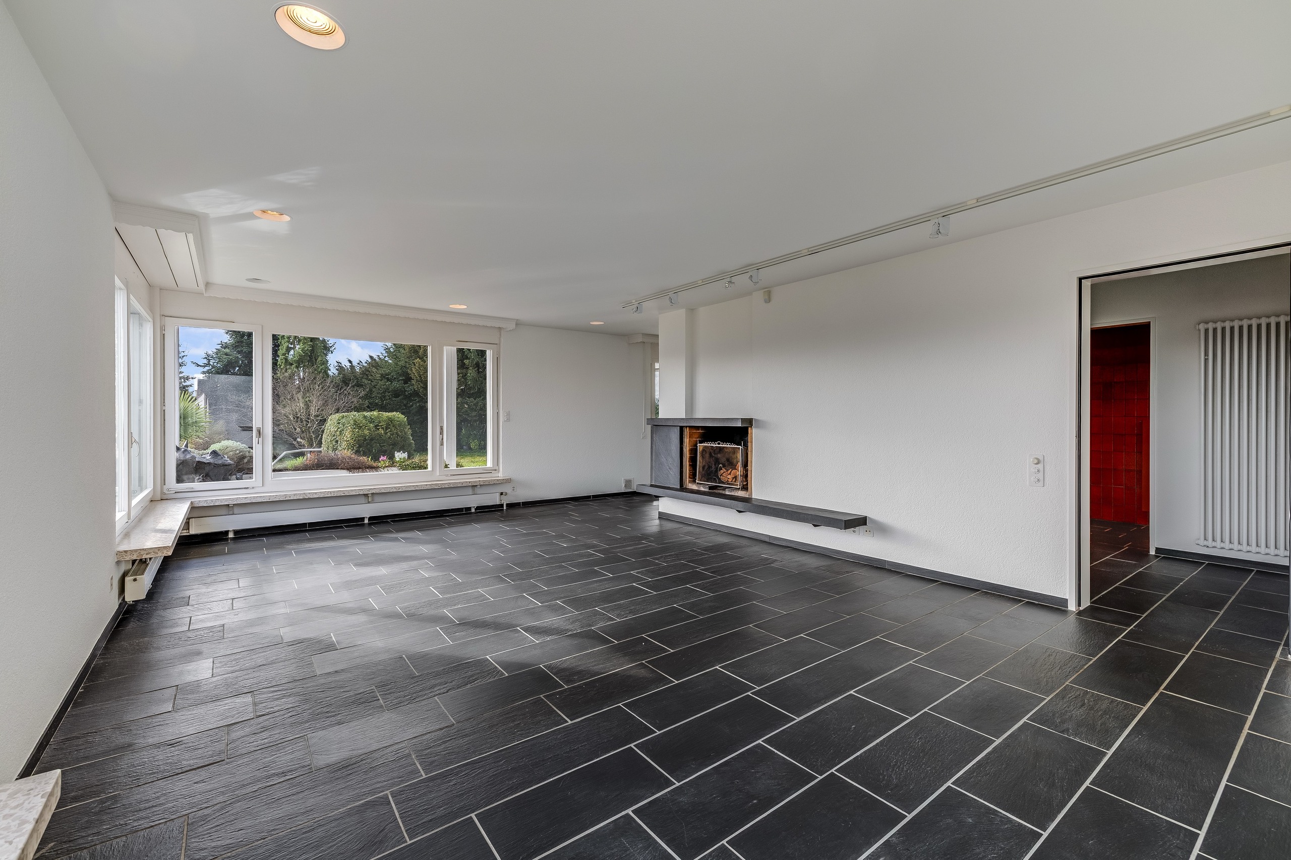 Wohnzimmer mit Cheminée