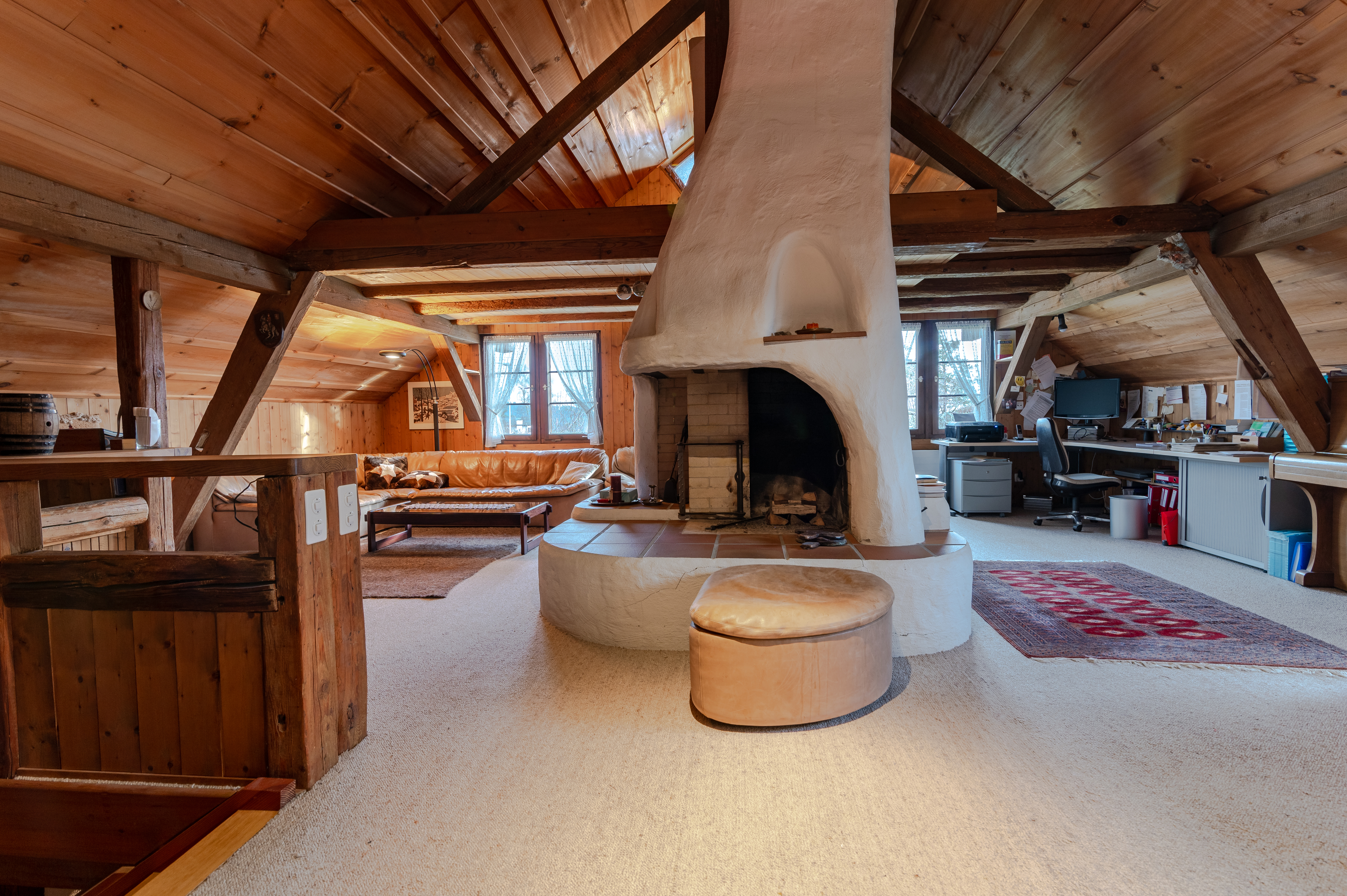 Wohnzimmer mit Cheminée im OG Wohnzimmer mit Cheminée im OG