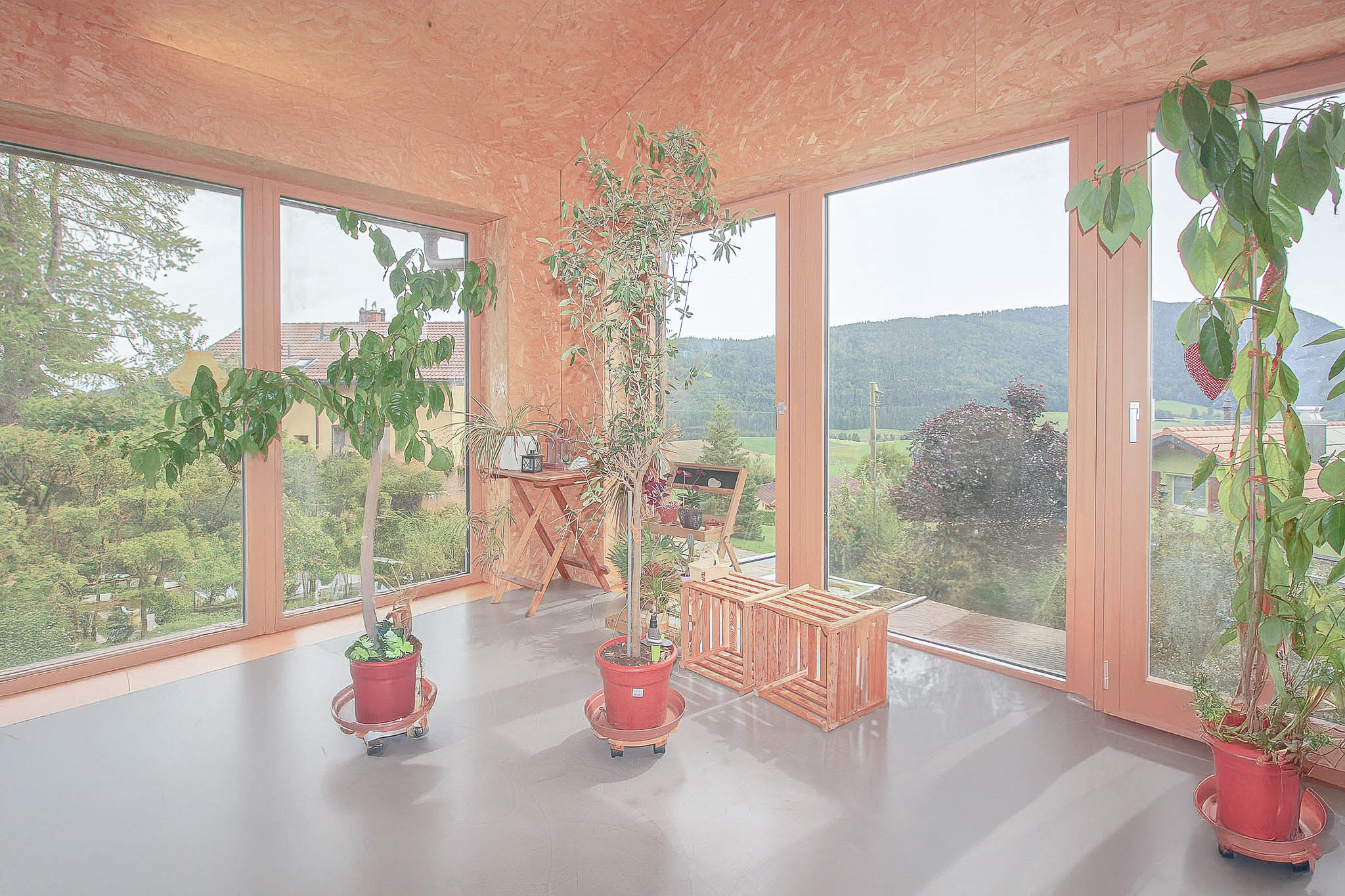 Véranda habitable au rez supérieur