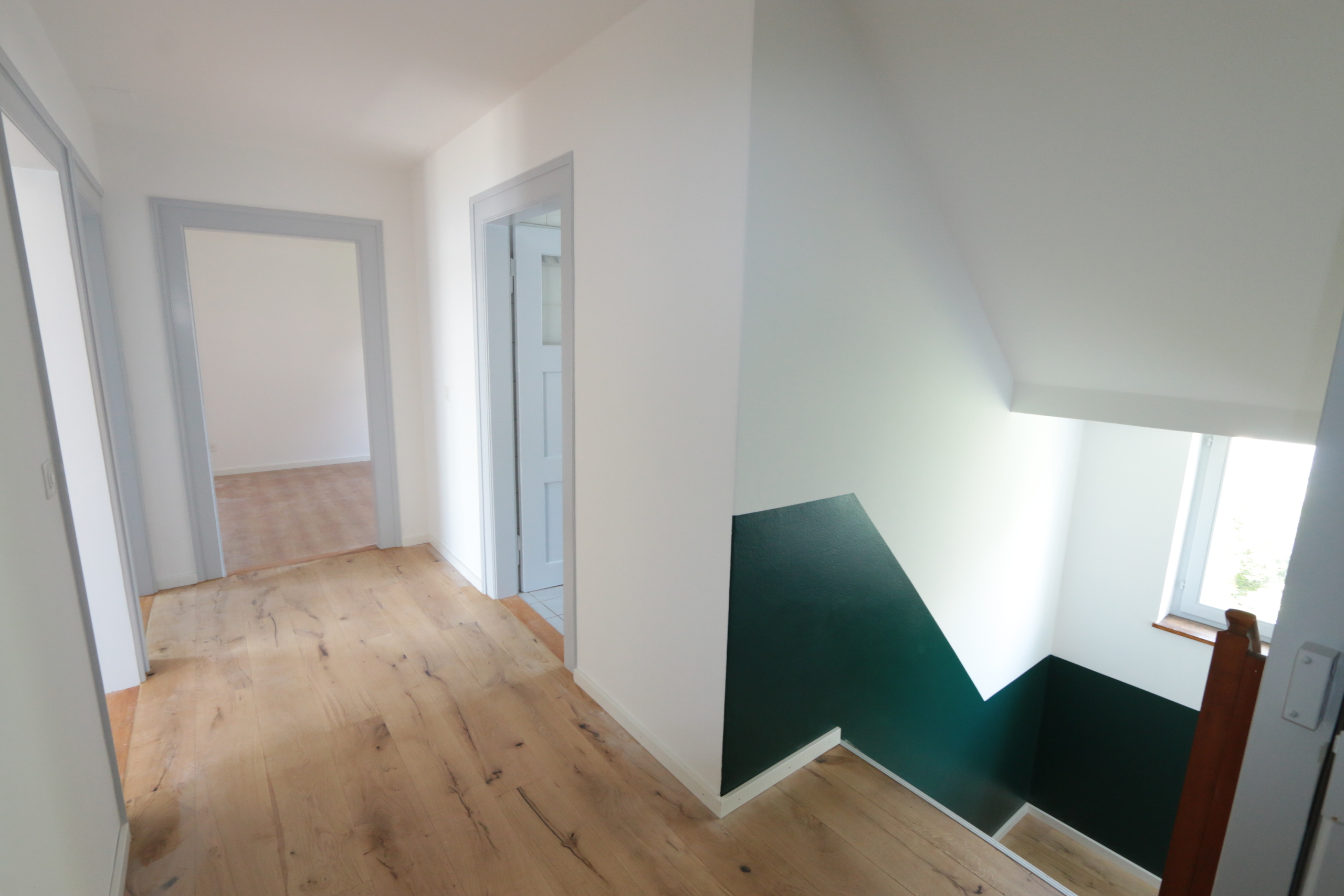 Flur- & Treppenhausbereich im 1. Obergeschoss