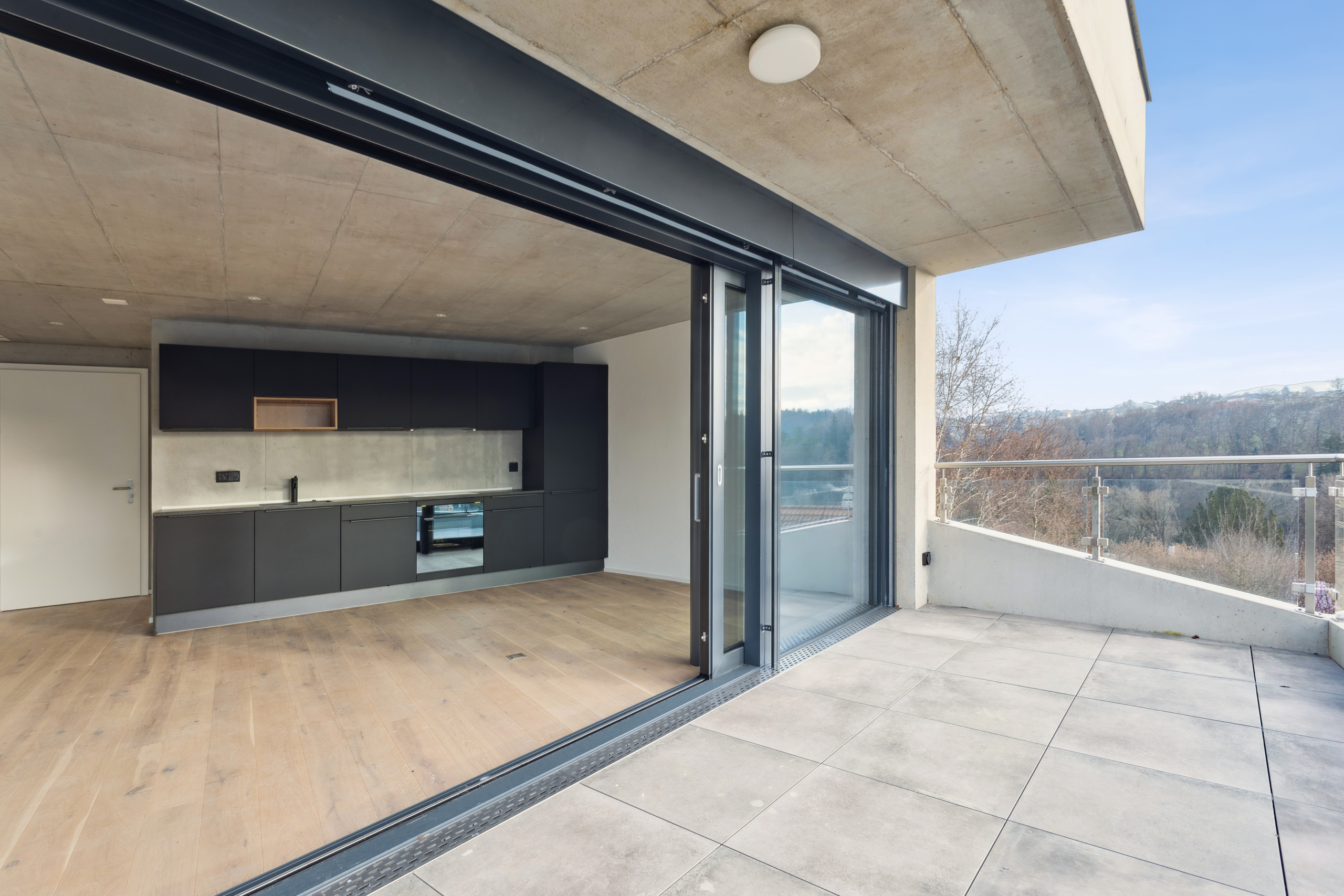 Balcony overlooking kitchen and dining room