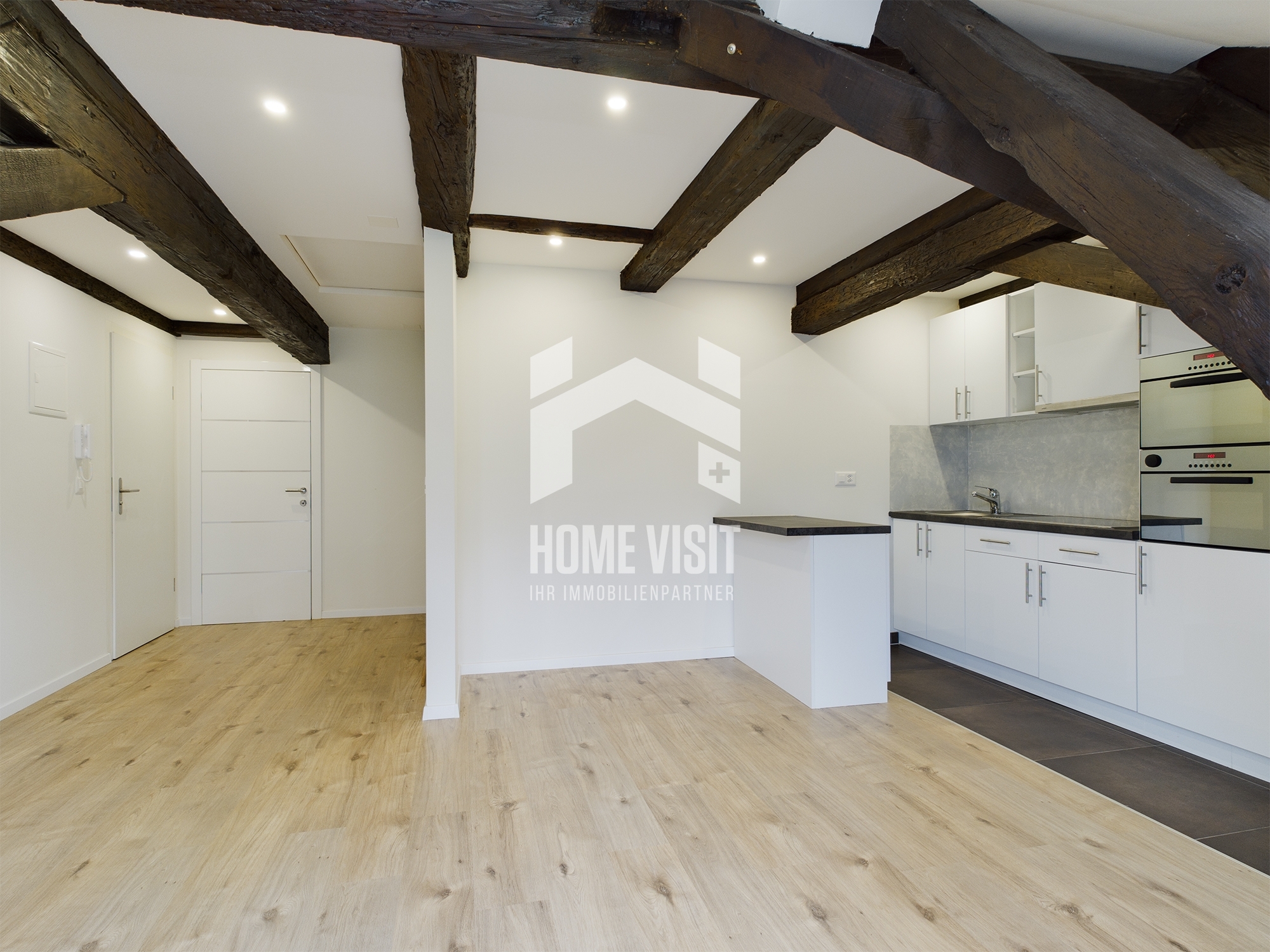 Wohnzimmer mit Küche