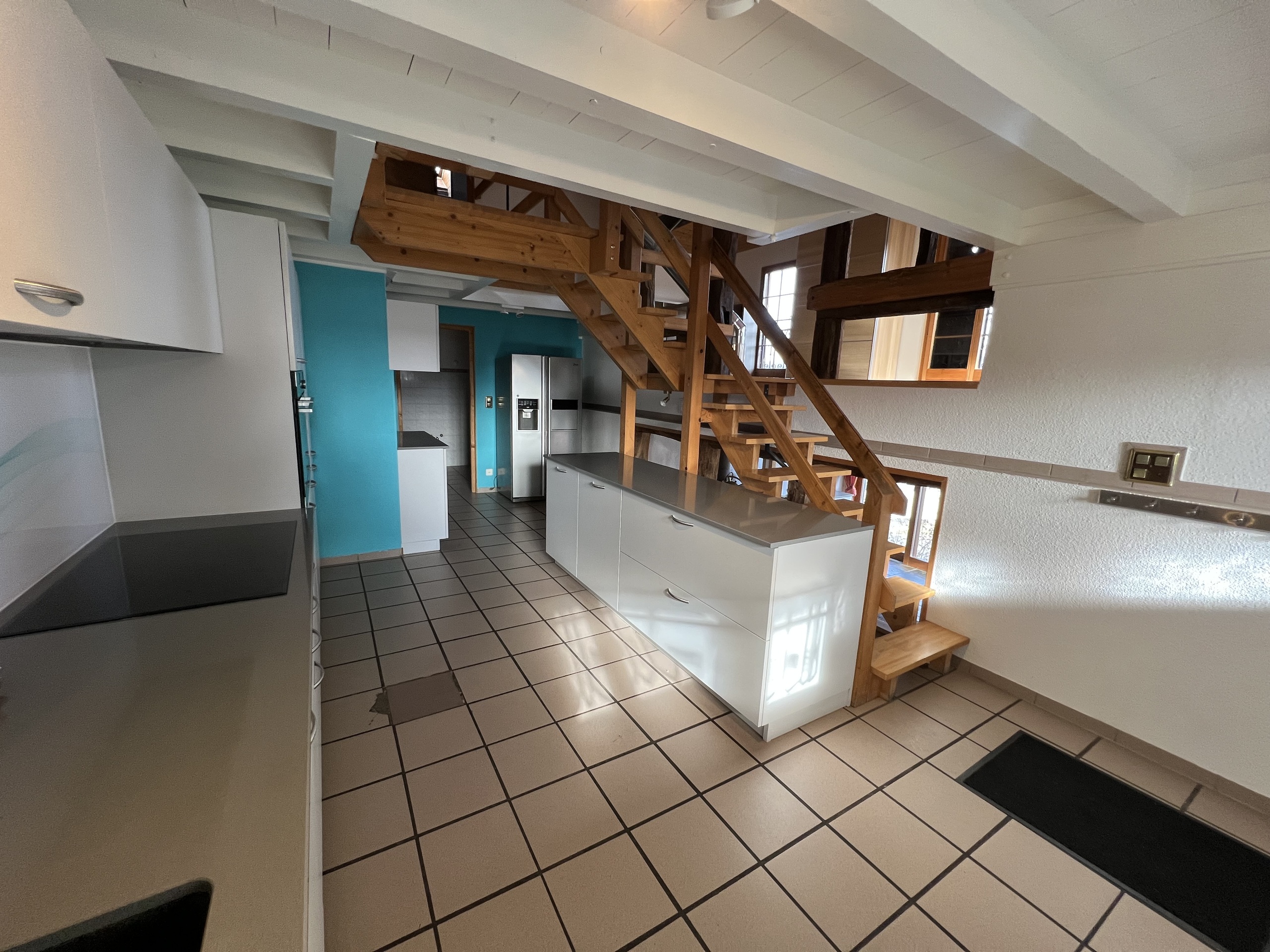 Kitchen with access to living room and dining room