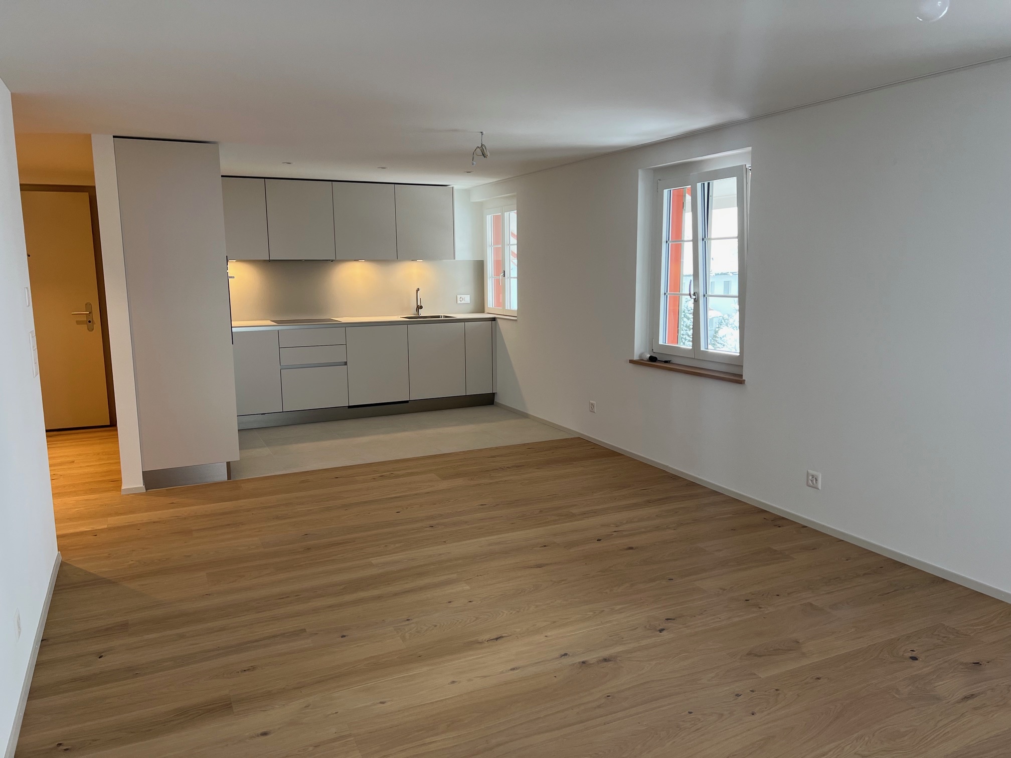 Wohnzimmer mit Küche