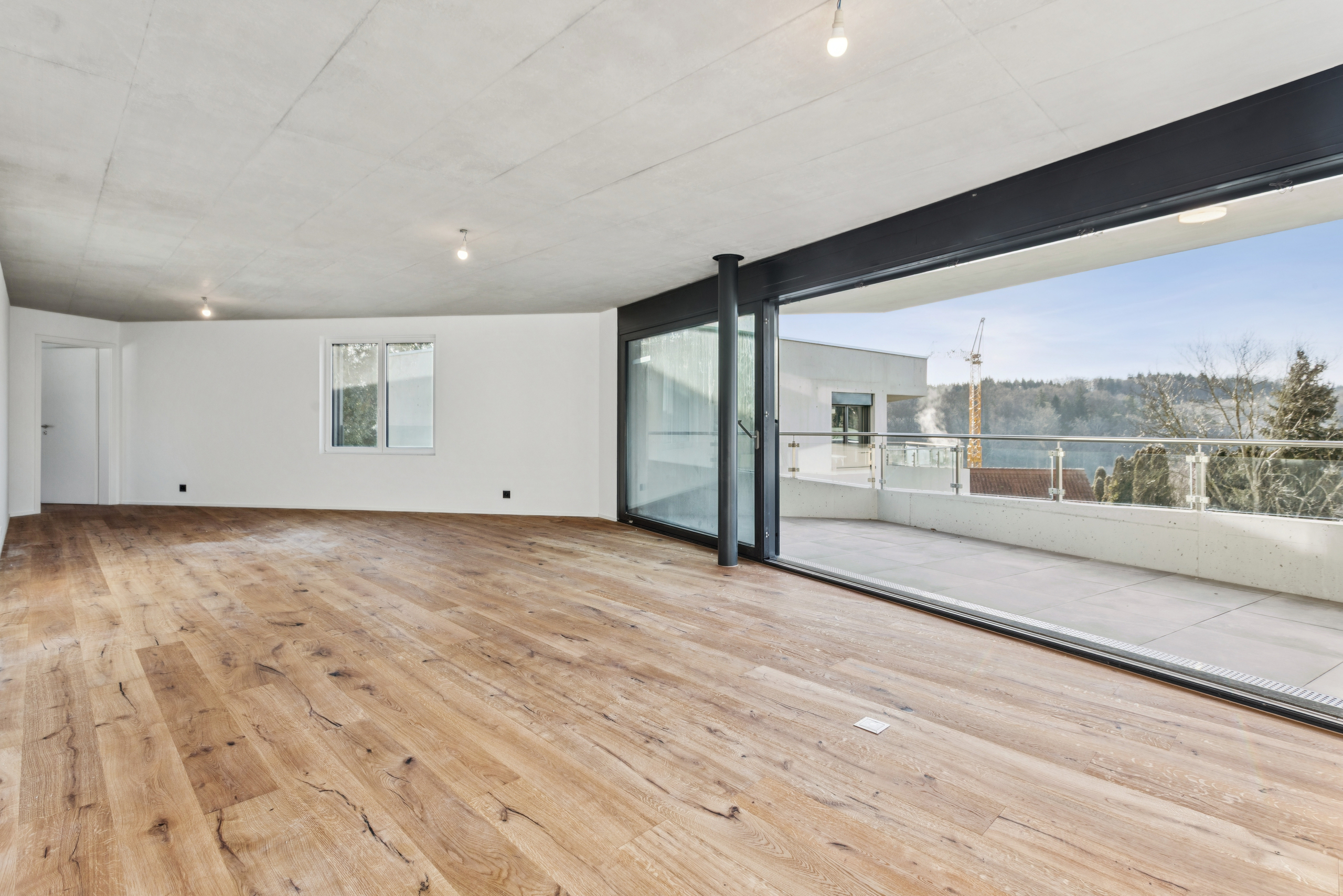 La pièce à vivre avec accès au balcon