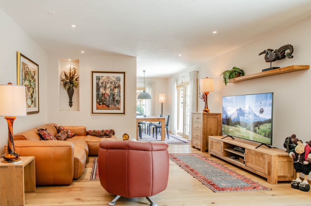 Wohnzimmer mit Zugang zur Terrasse