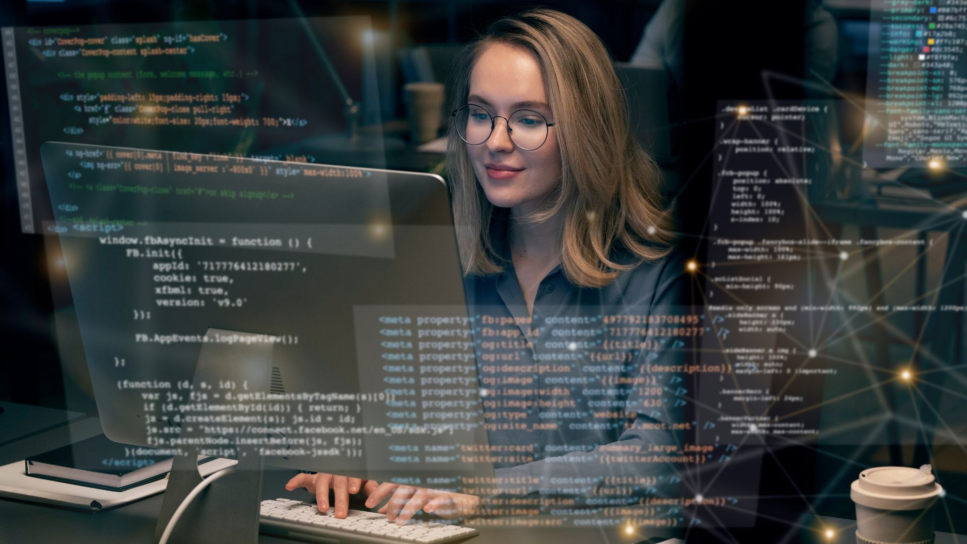 Software developer working with programming code, illustrating technology, software development, and digital innovation at IMMOMIG SA.