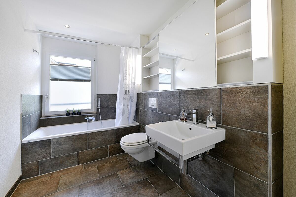 Badezimmer im Obergeschoss Badezimmer im Obergeschoss