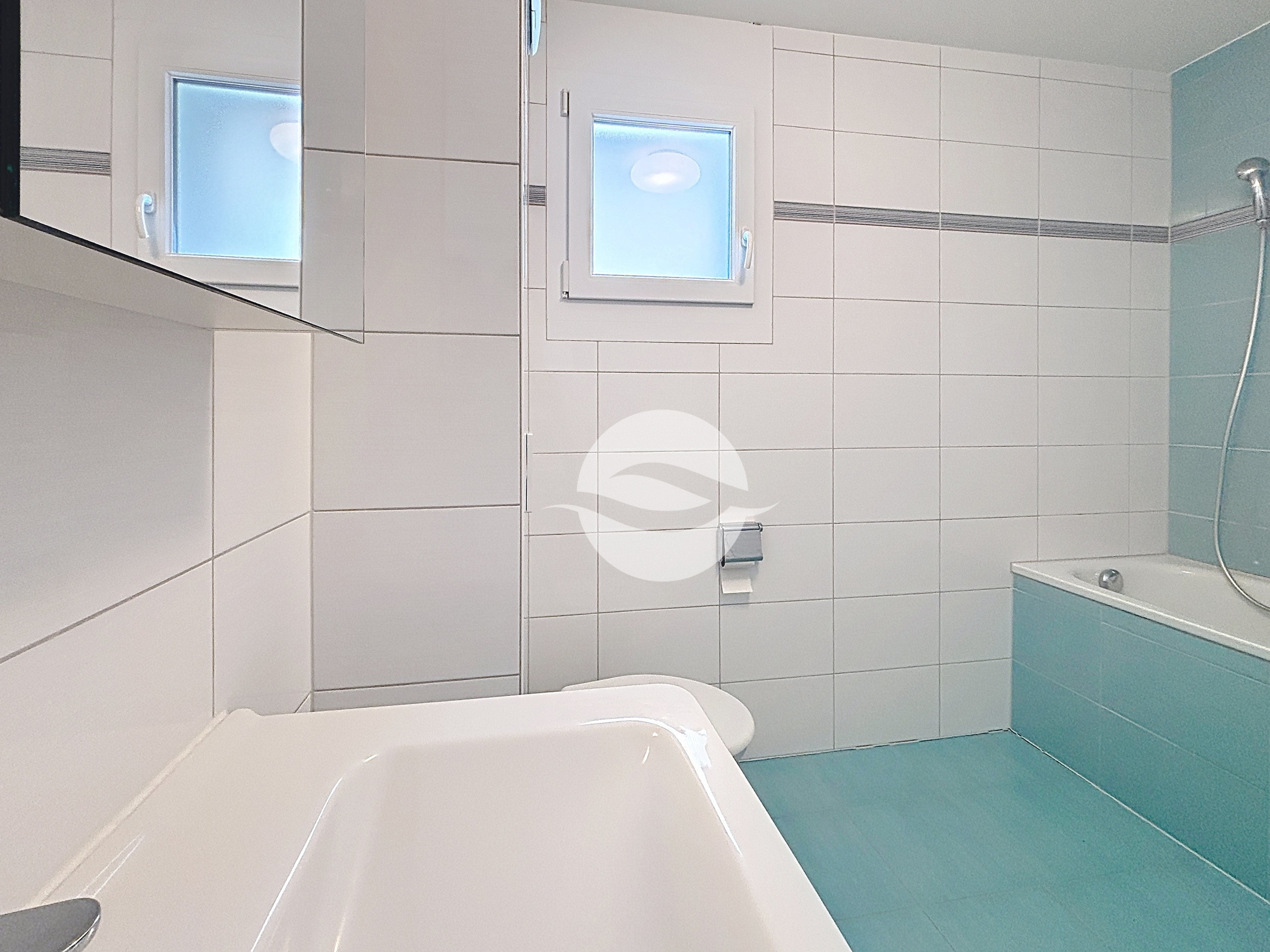 Salle de bains avec WC