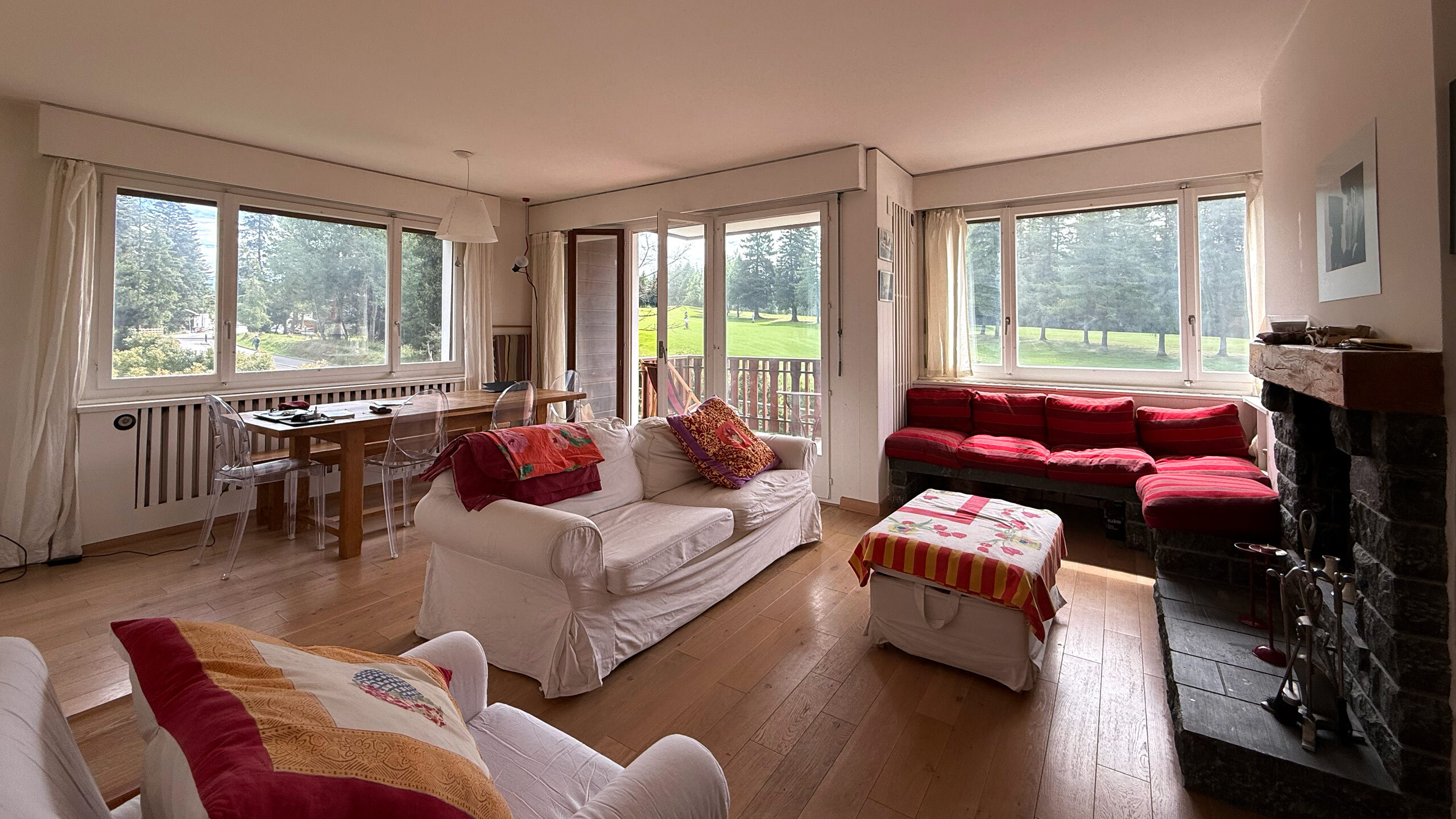 Lovely living room with loggia and uninterrupted view of the golf course