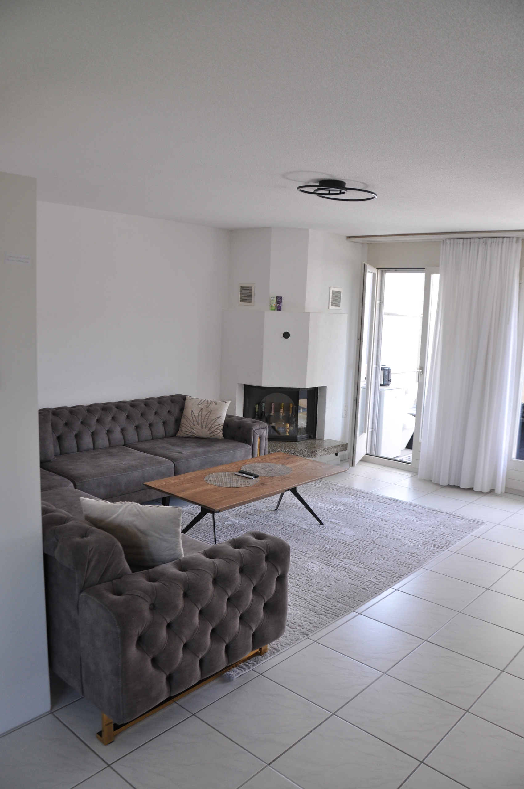 Wohnzimmer mit Cheminée 