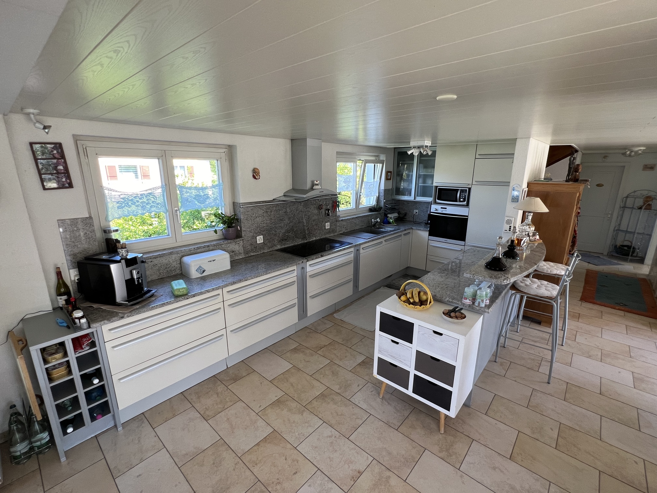Kitchen opening onto living room Kitchen opening onto living room