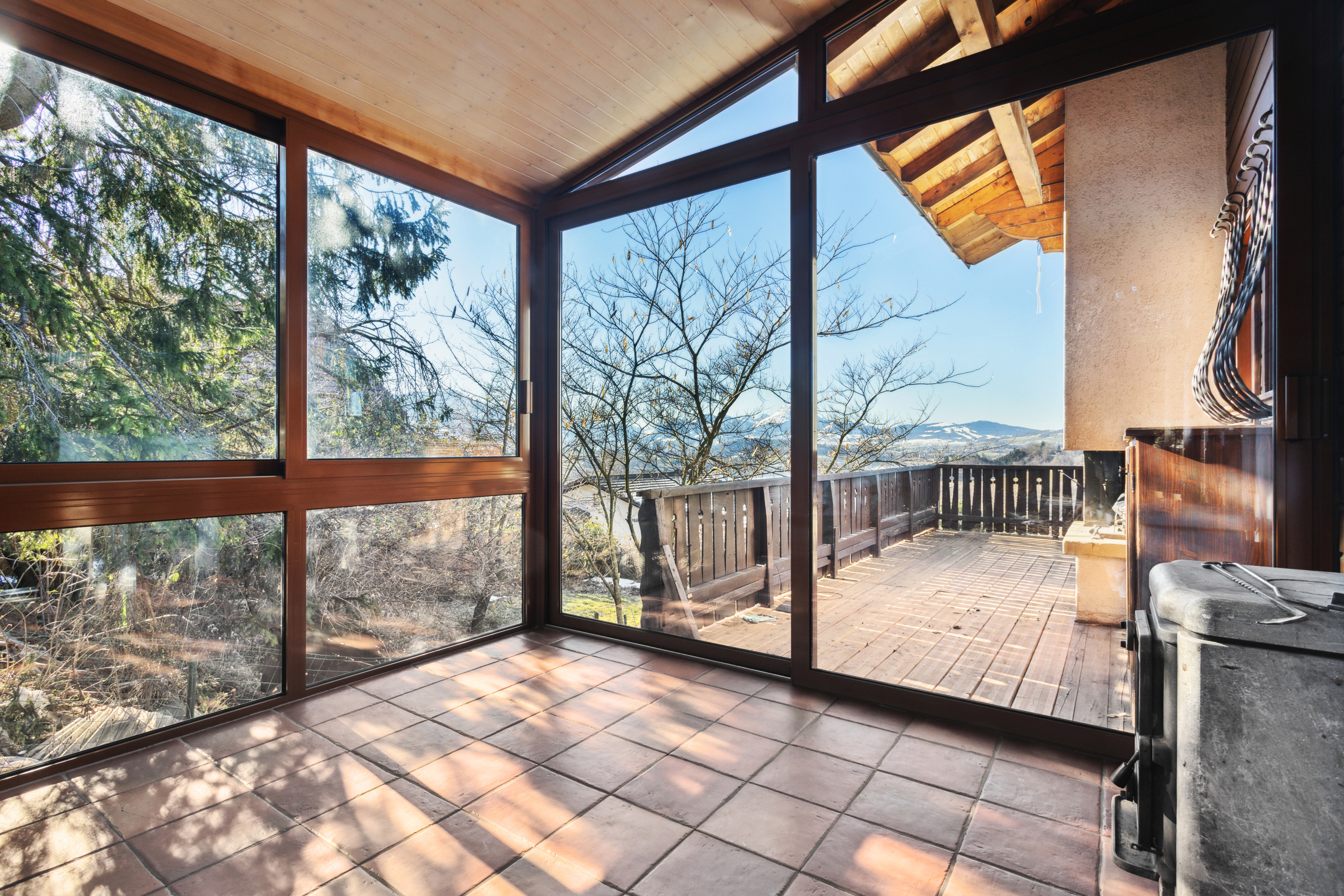 Wintergarten mit Specksteinofen Wintergarten mit Specksteinofen