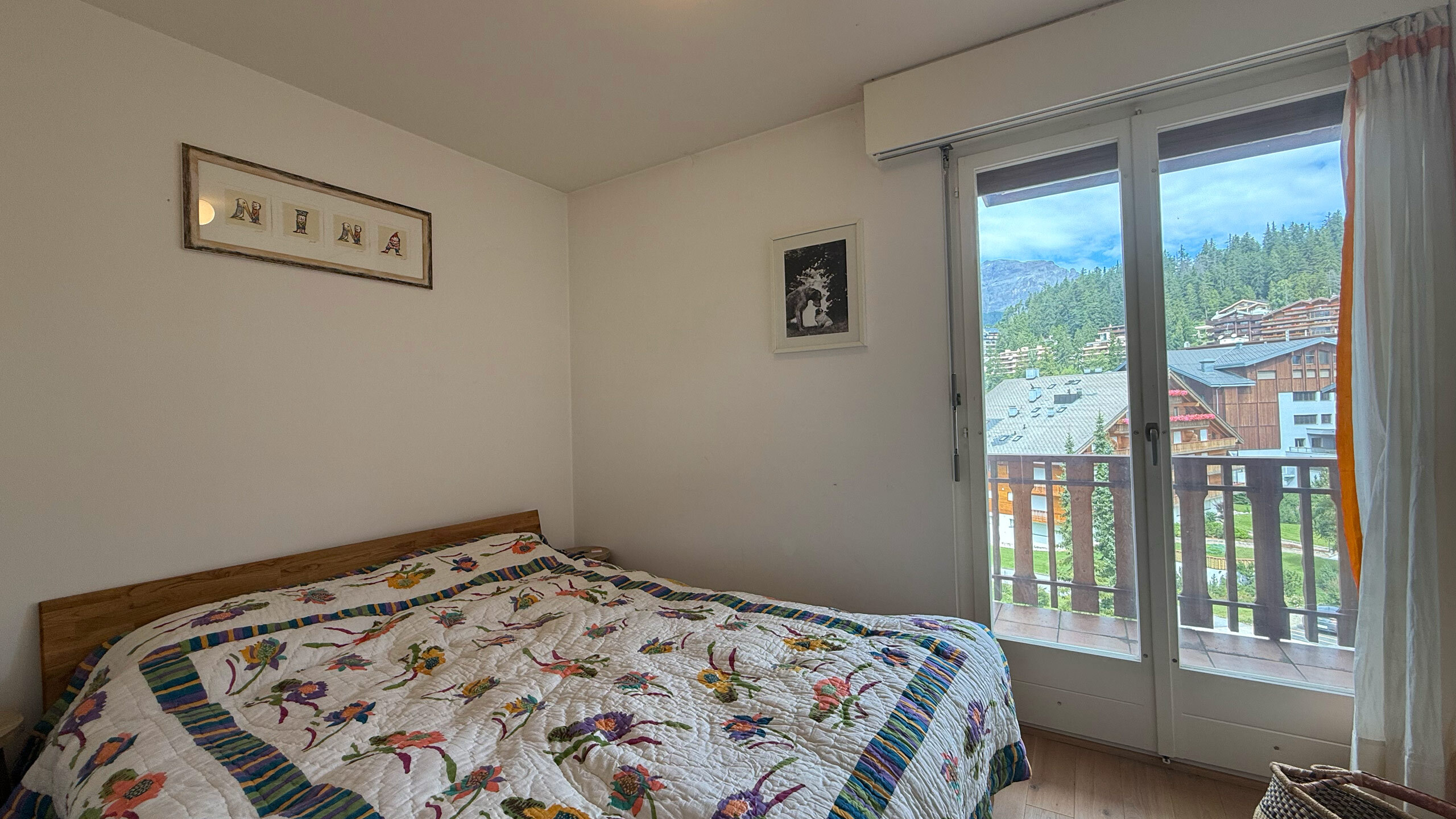 First bedroom with access to north-facing balcony