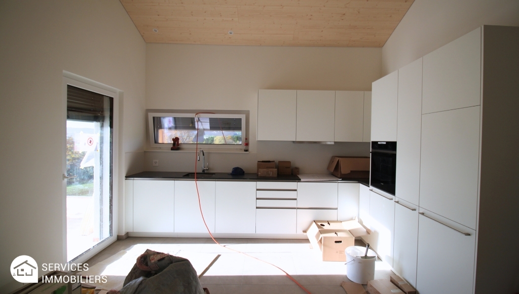 Cuisine habitable avec accès terrasse