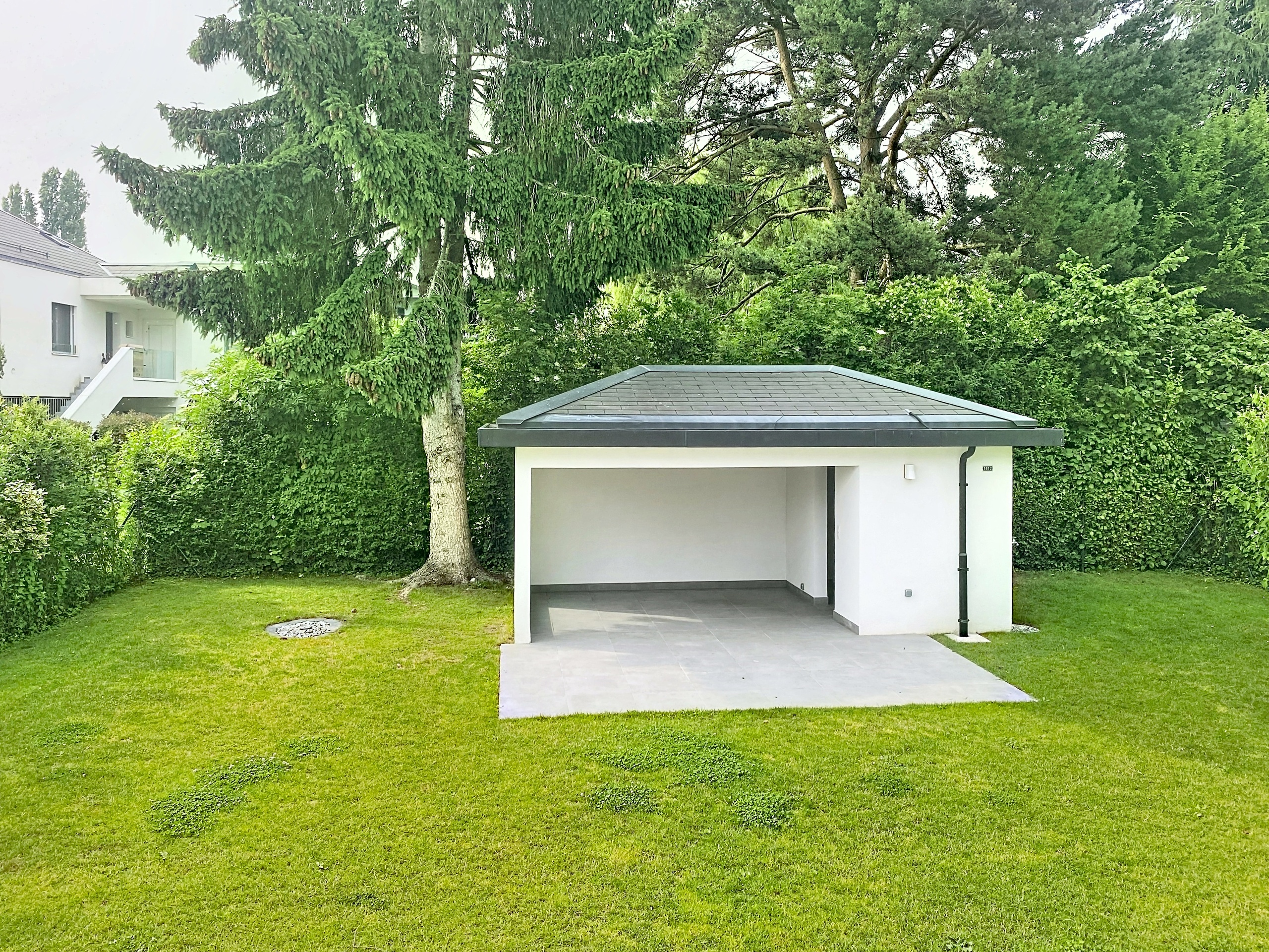 Jardin avec maisonnette et coin cuisine