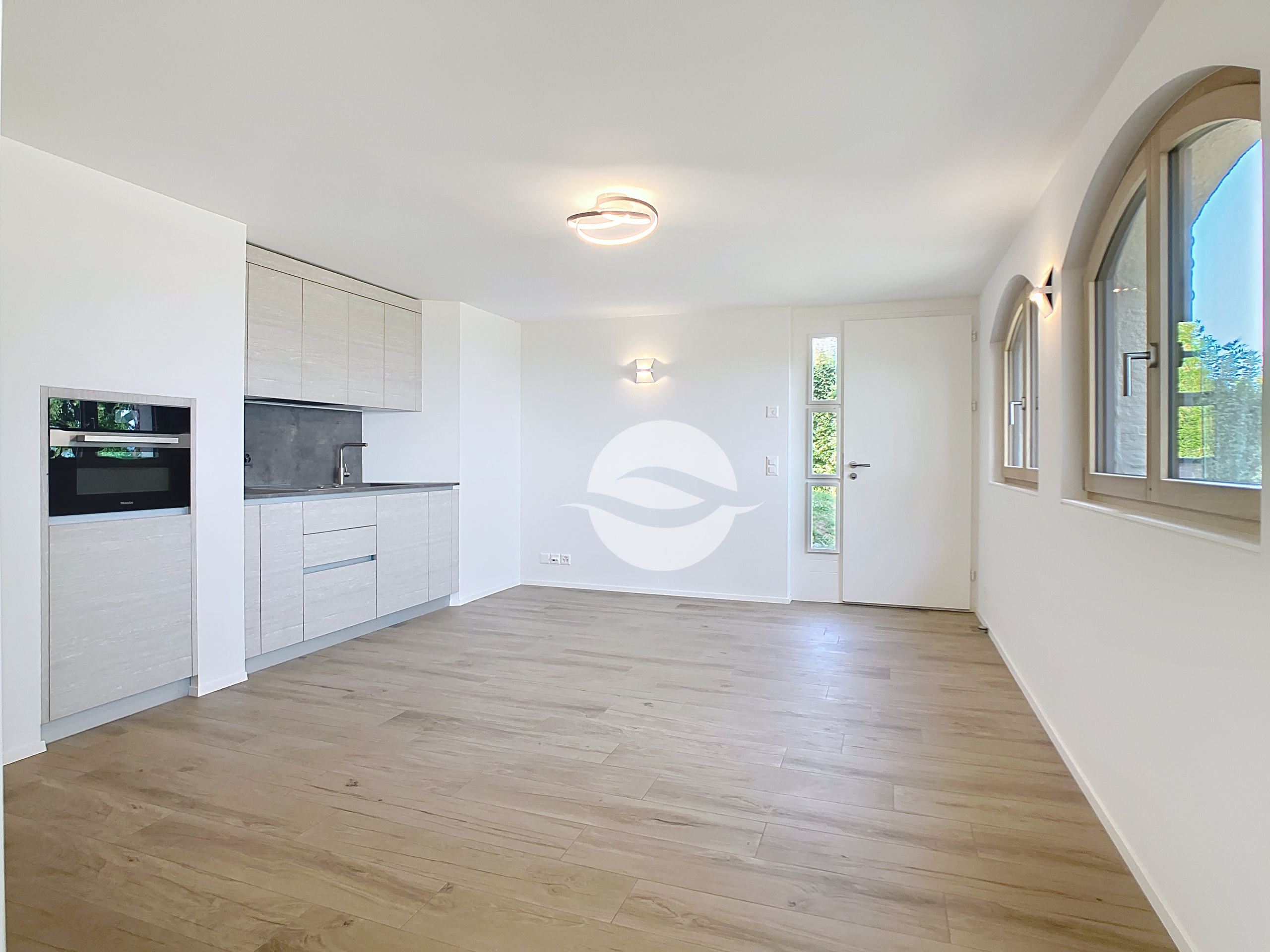 Rez inf. : Appartement indépendant - Séjour avec cuisine