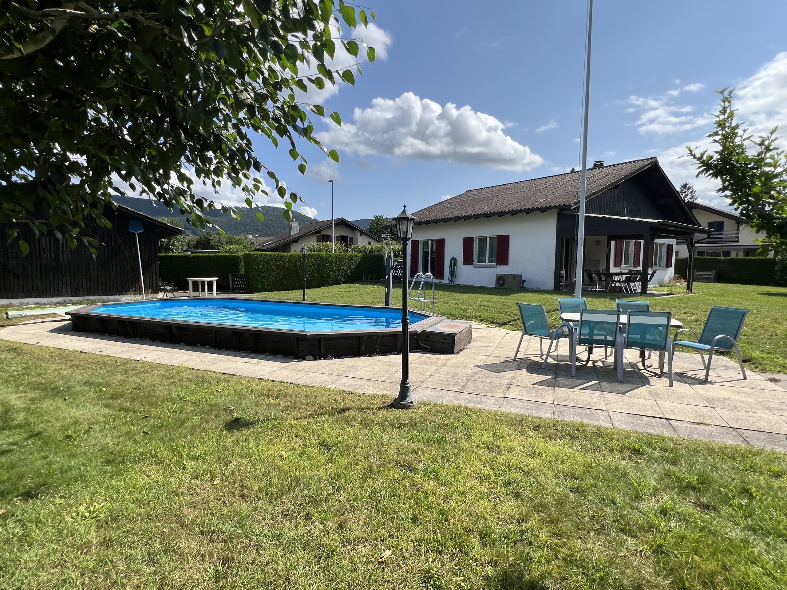Swimming pool with barbecue area