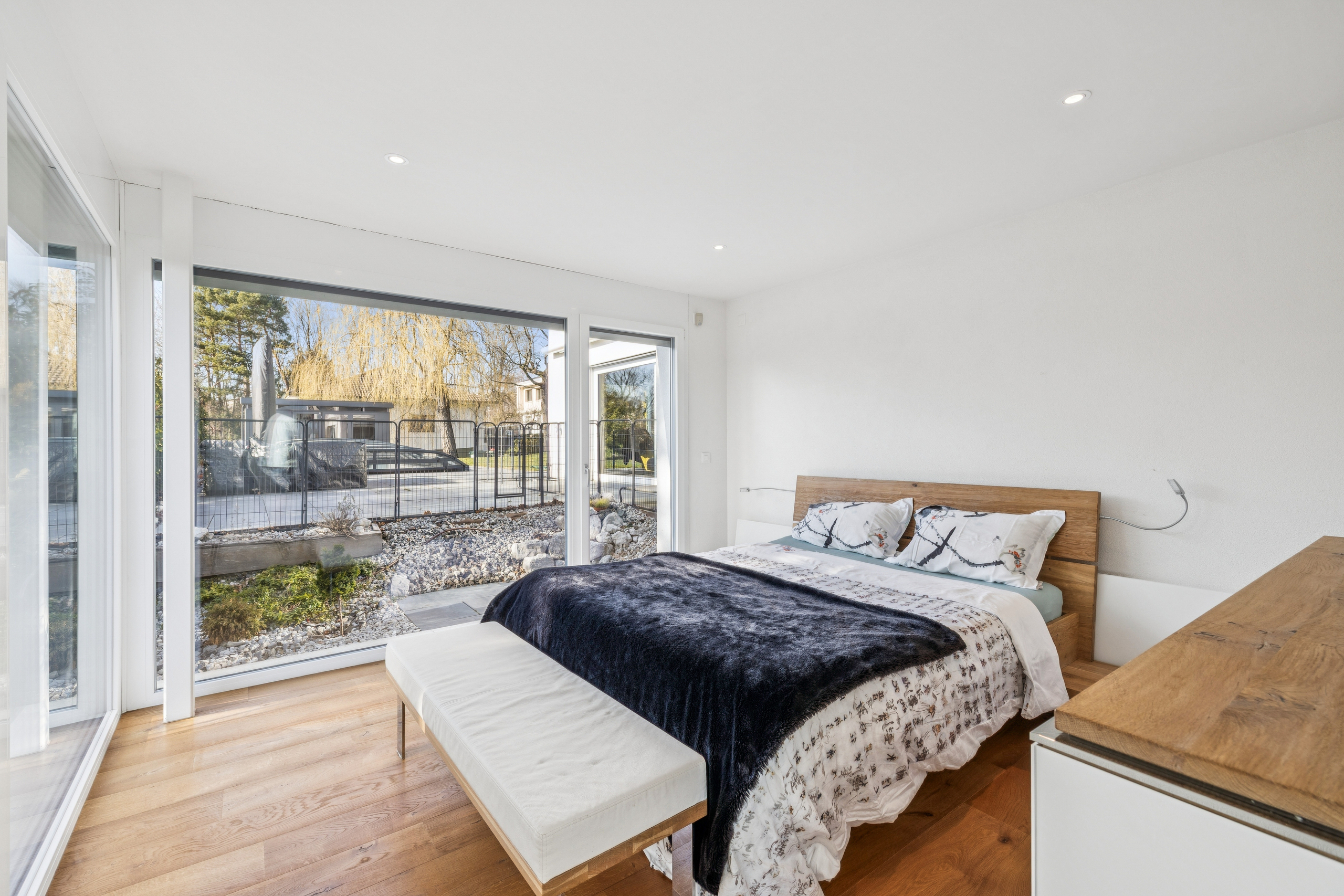 Chambre parentale avec accès à une terrasse