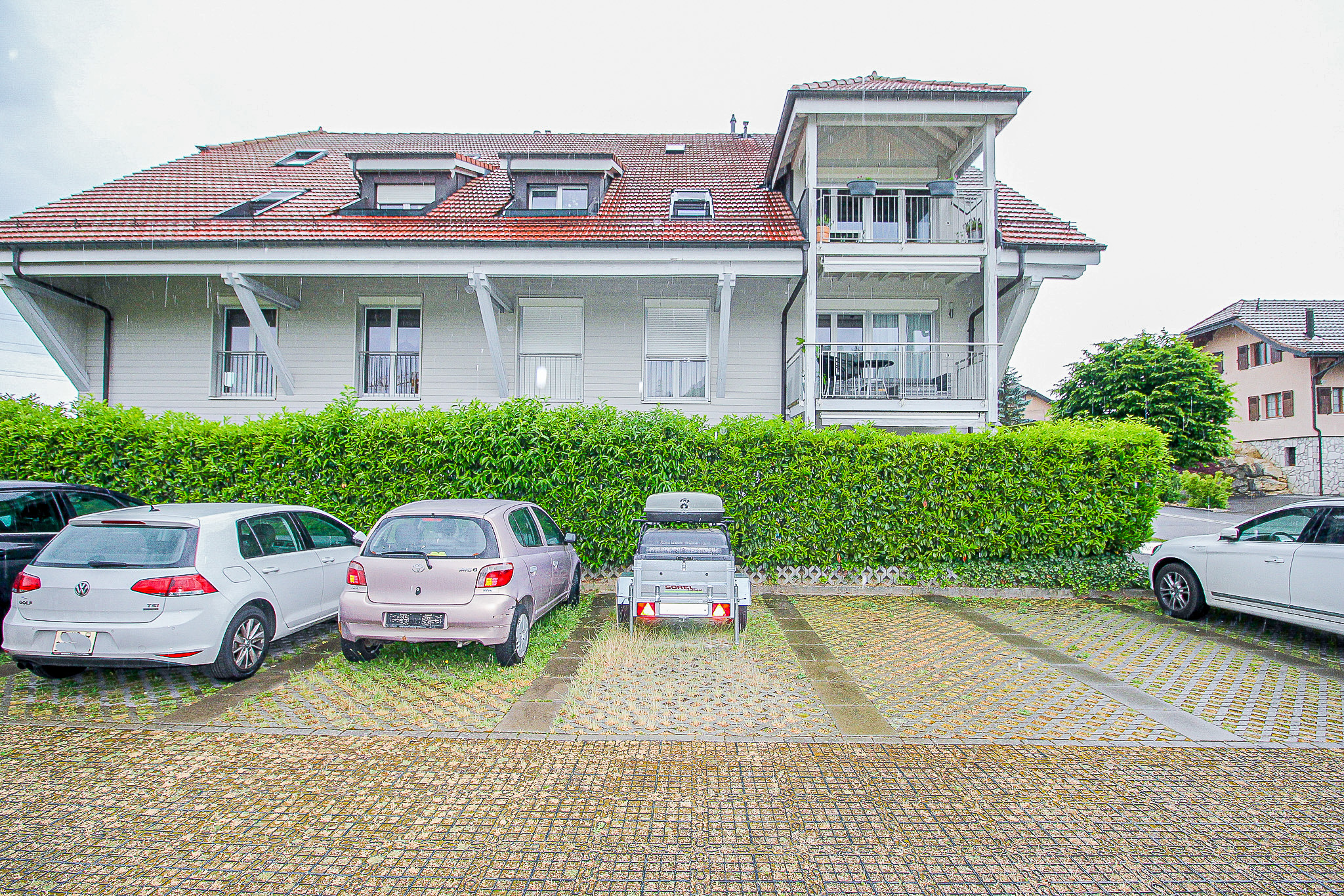 Place de parc extérieure en sus