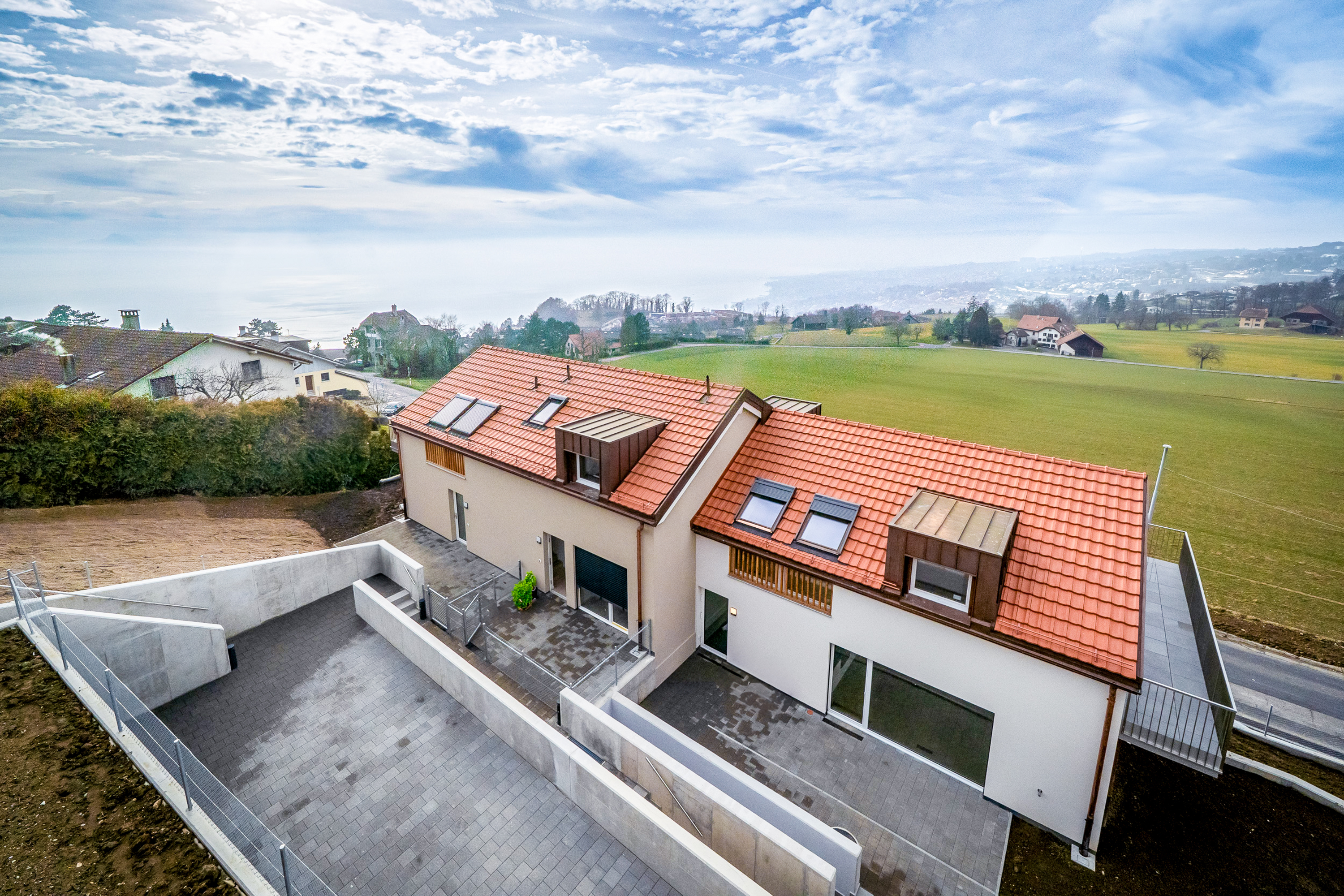 Appartements construits à Grandvaux avec un magnifique dégagement sur le lac Léman, les Alpes et le Jura.
