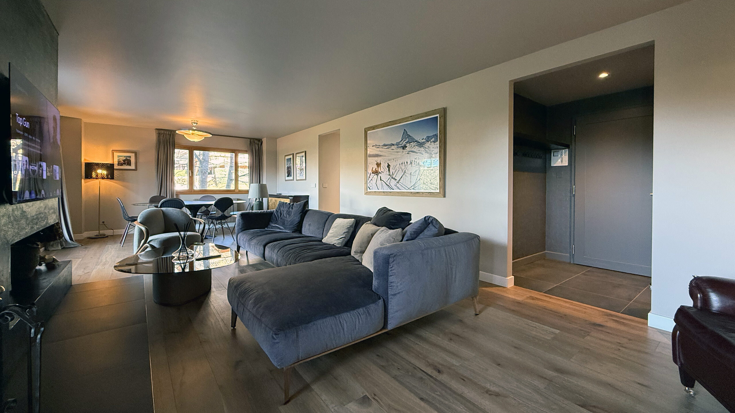 Living room with large sofa and fireplace Living room with large sofa and fireplace